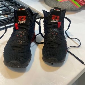 Red and black like new Mens LeBron 17 shoes. Size 7